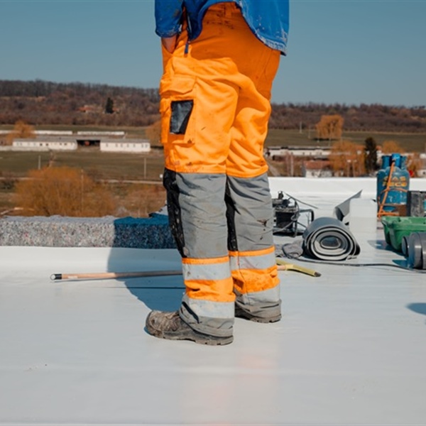 What Are the Most Common Problems With Flat Commercial Roofing Systems After Storms?