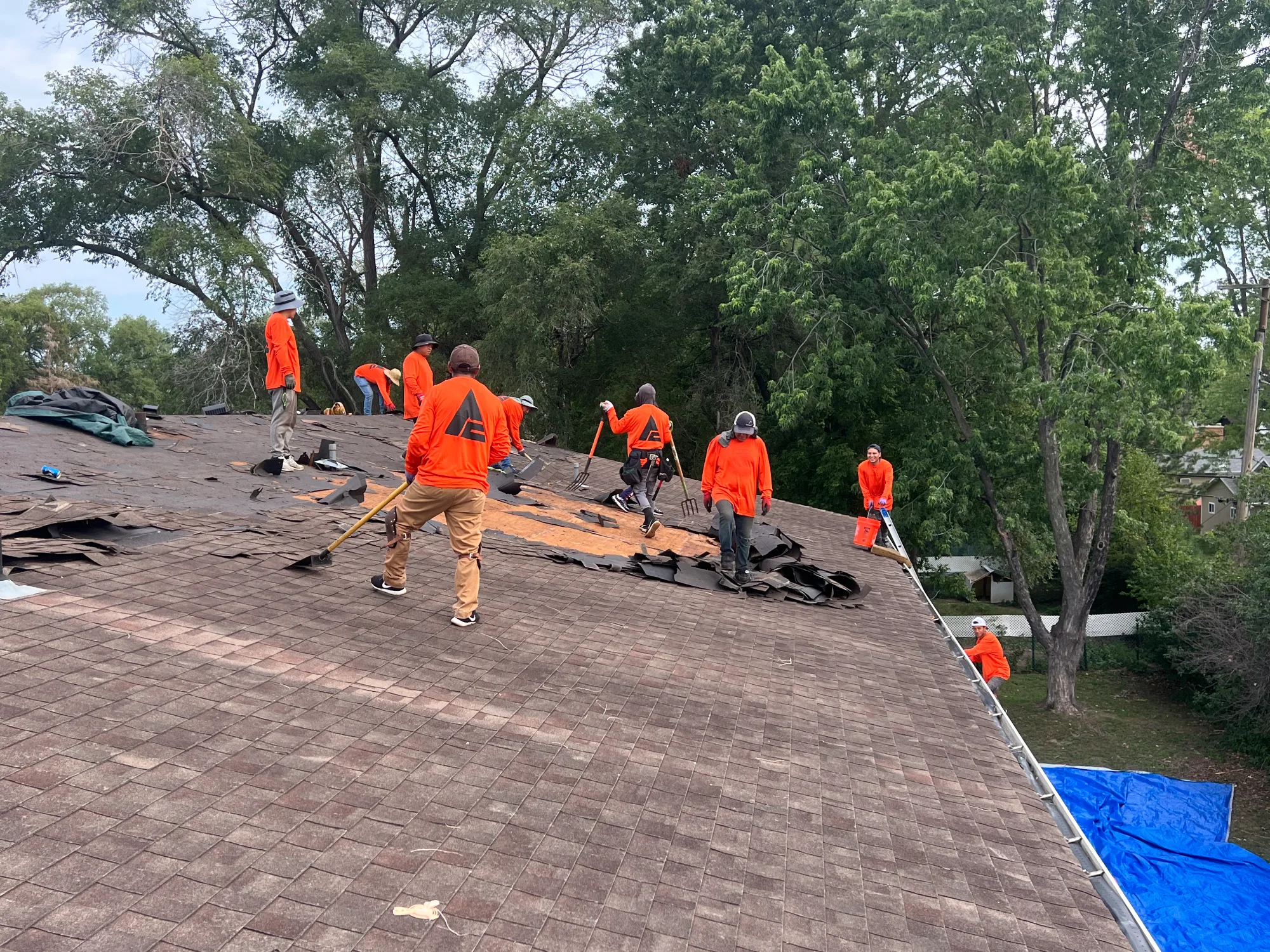 Allied Construction crew working on a residential roof